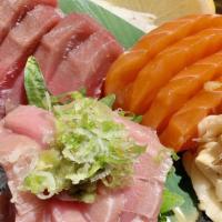 Sashimi (10 Pcs) · Served with spring roll shumai miso soup and rice.