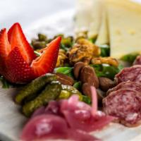 Charcuterie And/Or Cheese (3 Items) · Served with Toast, Nuts & Fruit