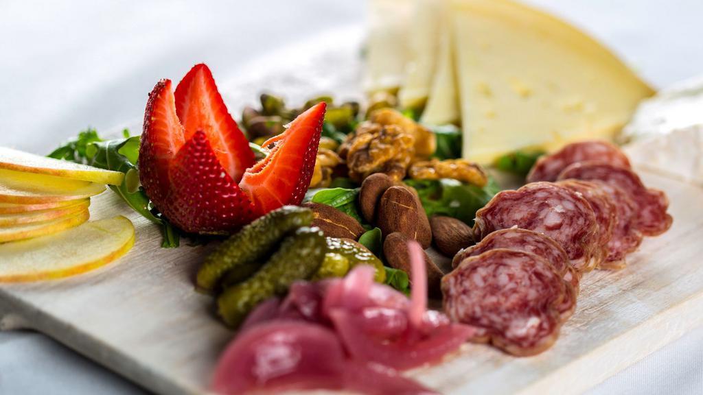 Charcuterie And/Or Cheese (3 Items) · Served with Toast, Nuts & Fruit