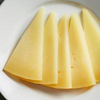 Queso · Marinated Manchego and Piquillos