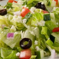Chopped Salad · Chopped greens, cucumbers, red onions, tomatoes, olives, feta, red wine vinaigrette