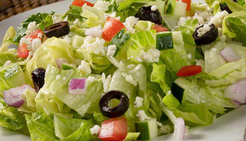 Chopped Salad · Chopped greens, cucumbers, red onions, tomatoes, olives, feta, red wine vinaigrette