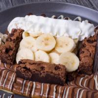 Brownie Crepe · Crepe, brownie, whipped cream, banana, rich Belgian chocolate, vanilla ice cream.