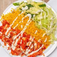 Chicken Over Rice & Salad · Halal chicken cooked with onions and peppers over rice and salad. Topped with choices of sau...