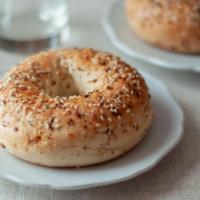 Everything Bagel · Classic everything bagel with customer's choice of topping.