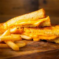 Classic Grilled Cheese Sandwich · White bread with American cheese, grilled to perfection.