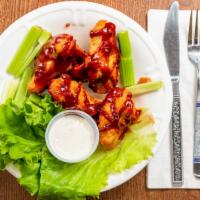 6 Piece Wings · (hormone free chicken) served with celery and choice of dipping sauce.