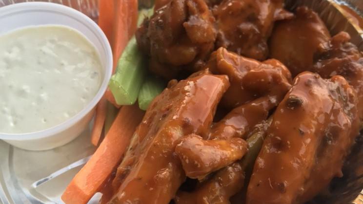 Breaded Wings · 8 piece wing order. With the choice of BBQ, Mild, Or Hot. Served with Blue Cheese, celery & carrots
