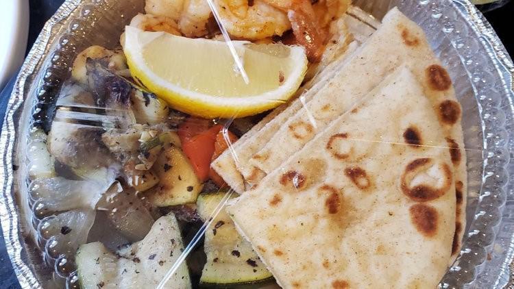 Shrimp Souvlaki Dinner Platter · Marinated and Broiled Shrimp. Served with a warm pita bread on the side. Served with a choice of soup or salad. Served with 2 sides.