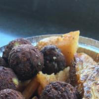 Falafel Dinner Platter · Fried Chickpea with Mediterranean Spices. Served with  warm pita bread on the side. Served w...