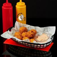 Jalapeno Poppers · Spicy jalapenos, battered and deep fried, served with ranch dressing.
