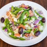 Levitt Salad · Cucumbers, red onions, tomatoes, bell peppers and feta cheese in our house vinaigrette dress...