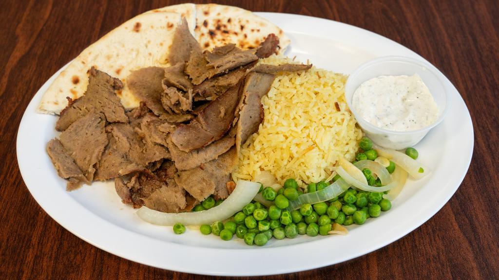 Lamb Gyro Platter · Thinly sliced lamb, herbs and spices carved fresh off of a rotisserie.