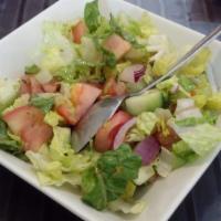 House Salad · Lettuce, tomatoes, cucumber, onion, lemon juice, and olive oil. Add chicken, shish, shawerma...