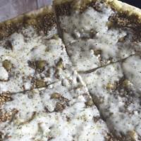 Zaatar Pie · Thyme, oregano, sesame seeds, and olive oil.