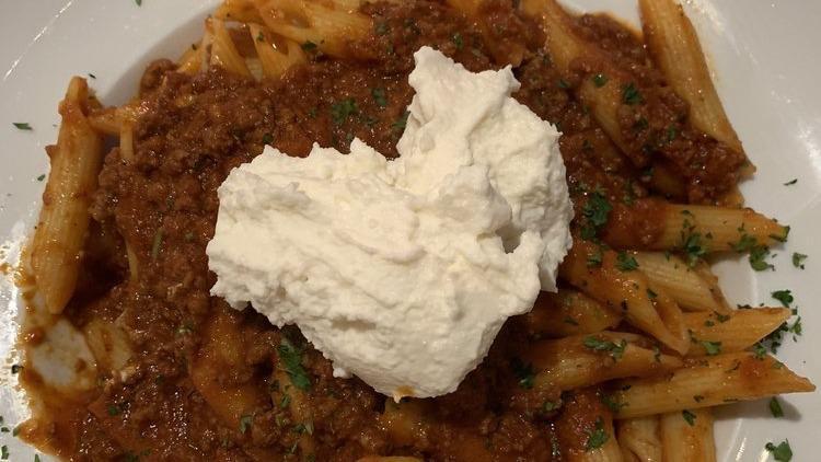Bolognese · Fresh Pasta in our Homemade Meat Sauce.