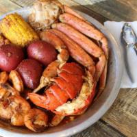 Weekend Special(Can Be Order Any Day) · 1 Lobster  Tail
1/2 LB Headless Shrimp
1 Cluster Snow Crab Legs