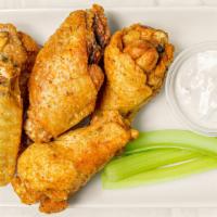Uncle Fred'S Dry Rub Wings · Chicken wings seasoned with uncle Fred's blend of spices.