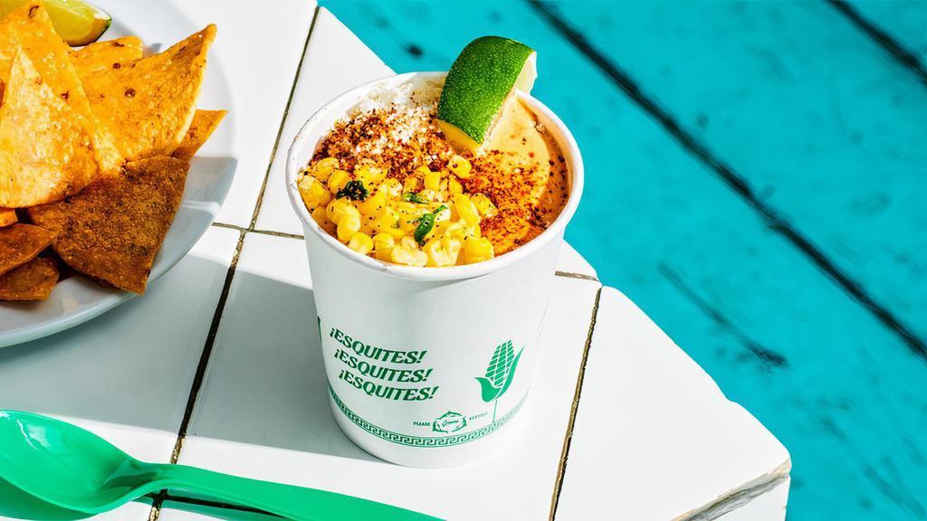 Corn Esquites. · Corn cut from the cob, topped with cotija cheese, homemade morita mayo, chile powder and fresh lime – and it’s all served in a cup.