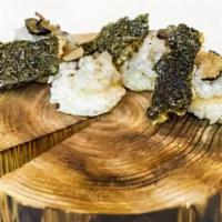 Scallop Truffle Canapes · Scallop tartare, truffle peeling, fried seaweed.