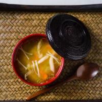 Miso Soup · Organic, silken tofu, enoki mushroom, carrot and scallion, shimeji mushroom, wakame seaweed.