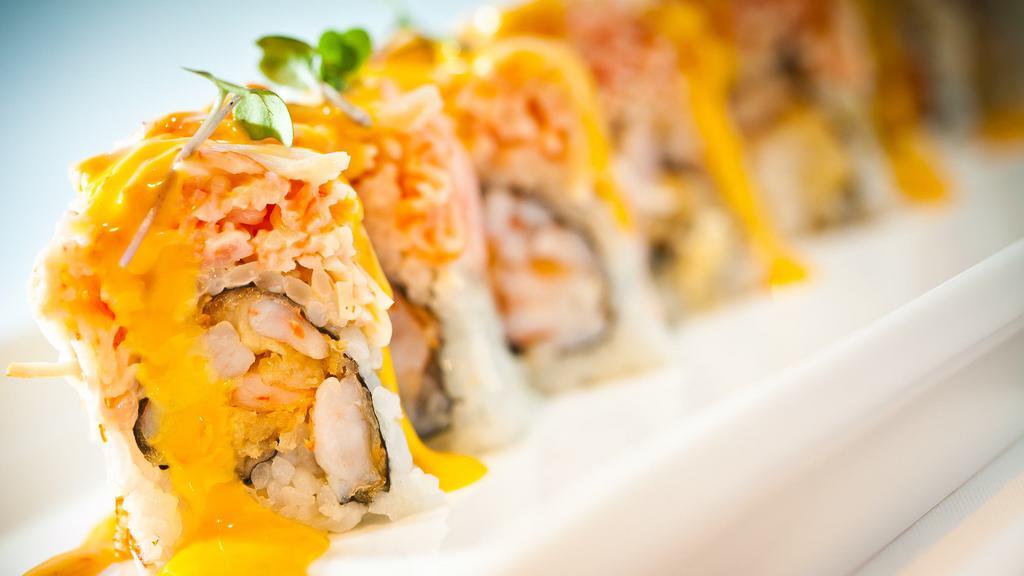 American Dream Roll · Spicy. Rock shrimp tempura topped with spicy Kani and spicy creamy sauce.