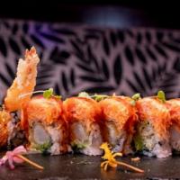 Angry Dragon Roll · Spicy. Shrimp tempura, avocado, topped with spicy Kani, citrus sweet miso, and eel sauce.