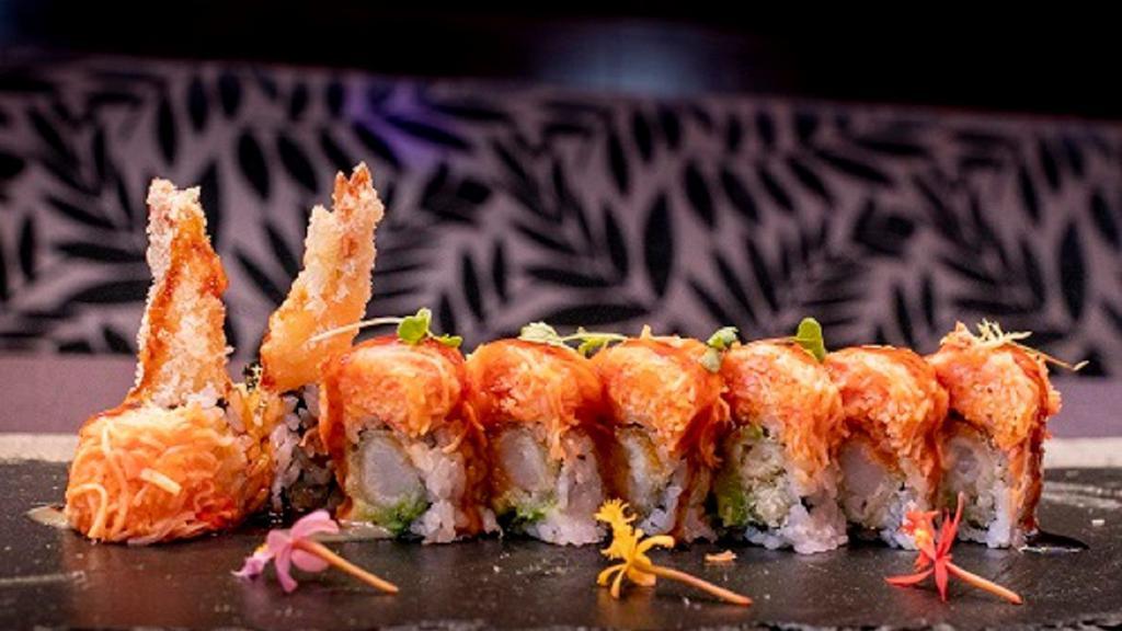 Angry Dragon Roll · Spicy. Shrimp tempura, avocado, topped with spicy Kani, citrus sweet miso, and eel sauce.