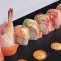 Sex On The Beach Roll · Spicy. Shrimp tempura and spicy tuna inside topped with tuna, salmon, avocado creamy yuzu, a...