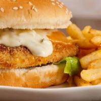Fish Sandwich · Beer battered fish lettuce tomatoes spicy mayo and fries.