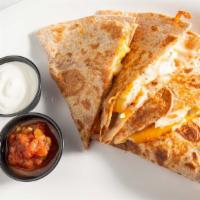 Quesadilla · Served with salsa, sour cream and guacamole