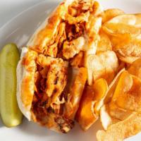 Buffalo Chicken Cheesesteak · Chicken cheesesteak smothered in homemade buffalo sauce, melted American cheese, and drizzle...