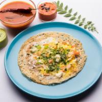 Egg Dosa · A fresh made thin Indian crepe made from a fermented batter of lentils and rice stuffed with...