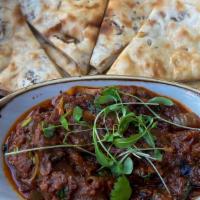 Eggplant Dip With Fig Naan · Grilled roasted, served hot.