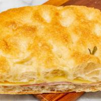 Don Camillo · Half Size Sandwhich on Focaccia Bread, Turkey and Swiss.