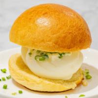 Uovo · One of our most popular items: on a bun, Sliced boiled Egg, Scallion, Mayonnaise, Prosciutto...