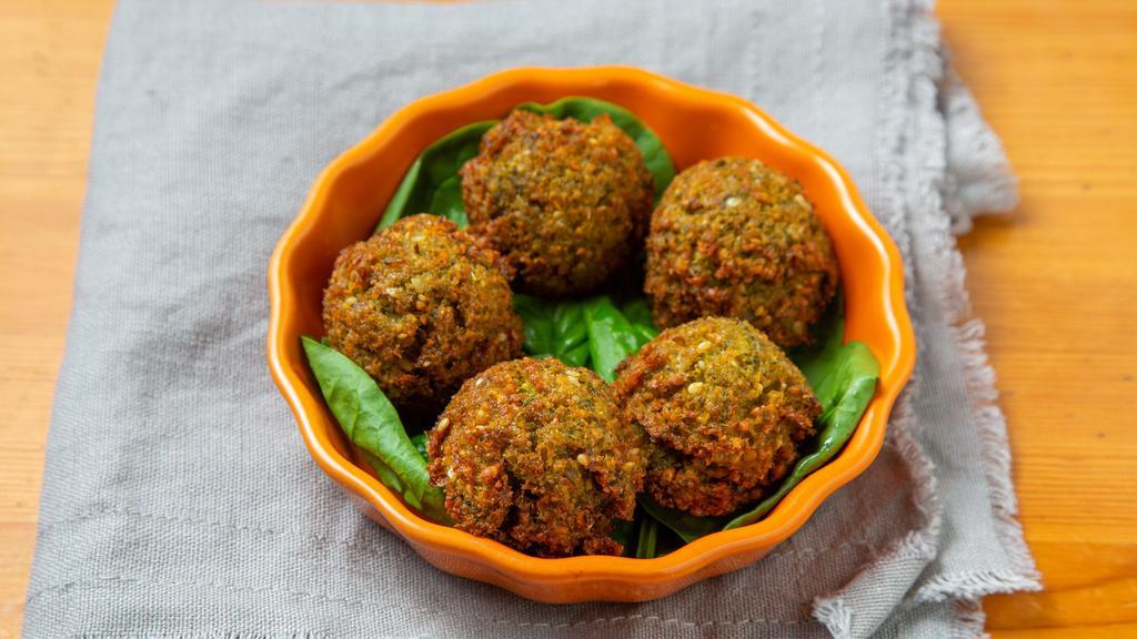 Falafel (5X) / Tahini · Homemade style, vegan and gluten-free, ground chickpeas, sesame seeds, and herbs.