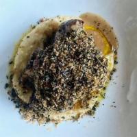 Osso Bucco · Braised pork shank, heirloom polenta, gremolata, jus