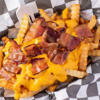 Loaded Fries · Regular Fries Topped with Hot Cheddar Cheese and Bacon