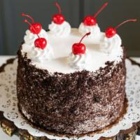 Black Forest Cake · Serves 8-10 people. A rich chocolate cake filled with chocolate whipped cream and cherries, ...