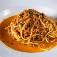Spaghetti · Meatballs or Bolognese sauce.