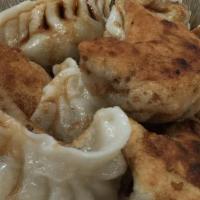 Fried Pork Dumplings · Eight pieces.