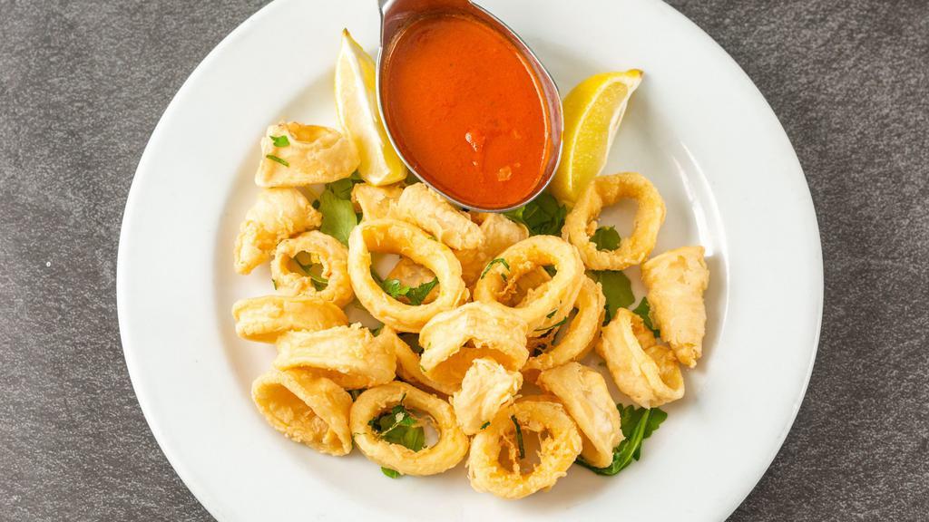 Calamari Fritti · Crispy calamari and marinara sauce.