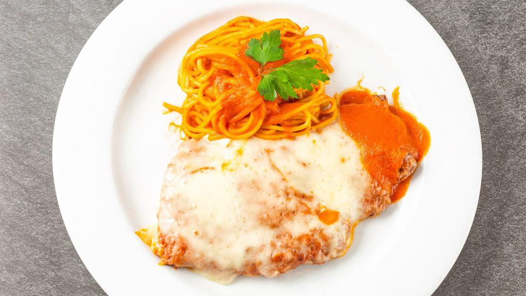 Chicken Parmigiana · Mozzarella, tomato sauce, and pasta.