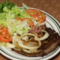 Beef Steak / Bistec Encebollado · Fresh Steak Cooked Well Done. Choice Of Onions or  No Onions. Option Of Side of your Choice....