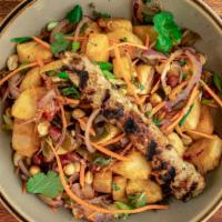 Crispy Yuca Salad · Crispy Yuca , Roasted Peppers , Red Onions , Peanuts, Pomegranate Seeds, Herbs , Pickled Car...