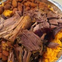 Roast Pork Platter · Pernil. Includes rice and beans.
