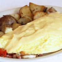 House Special Omelette · Ham, bacon, Portuguese sausage, tomato, onion, bell pepper, mushroom, potato, cheese and hol...