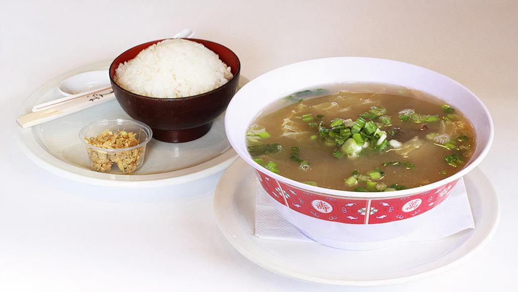 Oxtail Soup · A popular, flavorful local favorite! Served with rice.