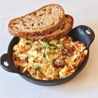 Bacon Scramble · Aged cheddar, caramelized onions with toasted country bread.